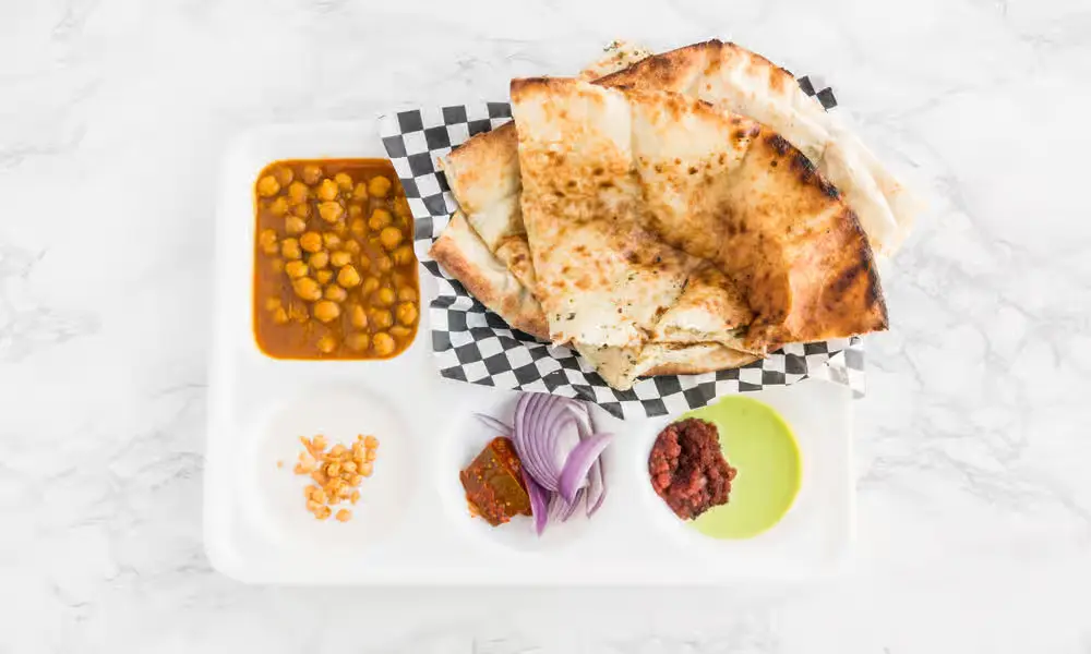 Apna Spicy Hut Amristari kulcha plate Winnipeg authentic Punjabi bread