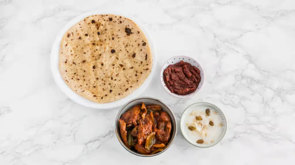 Apna Spicy Hut chicken meal Winnipeg complete Indian meal platter